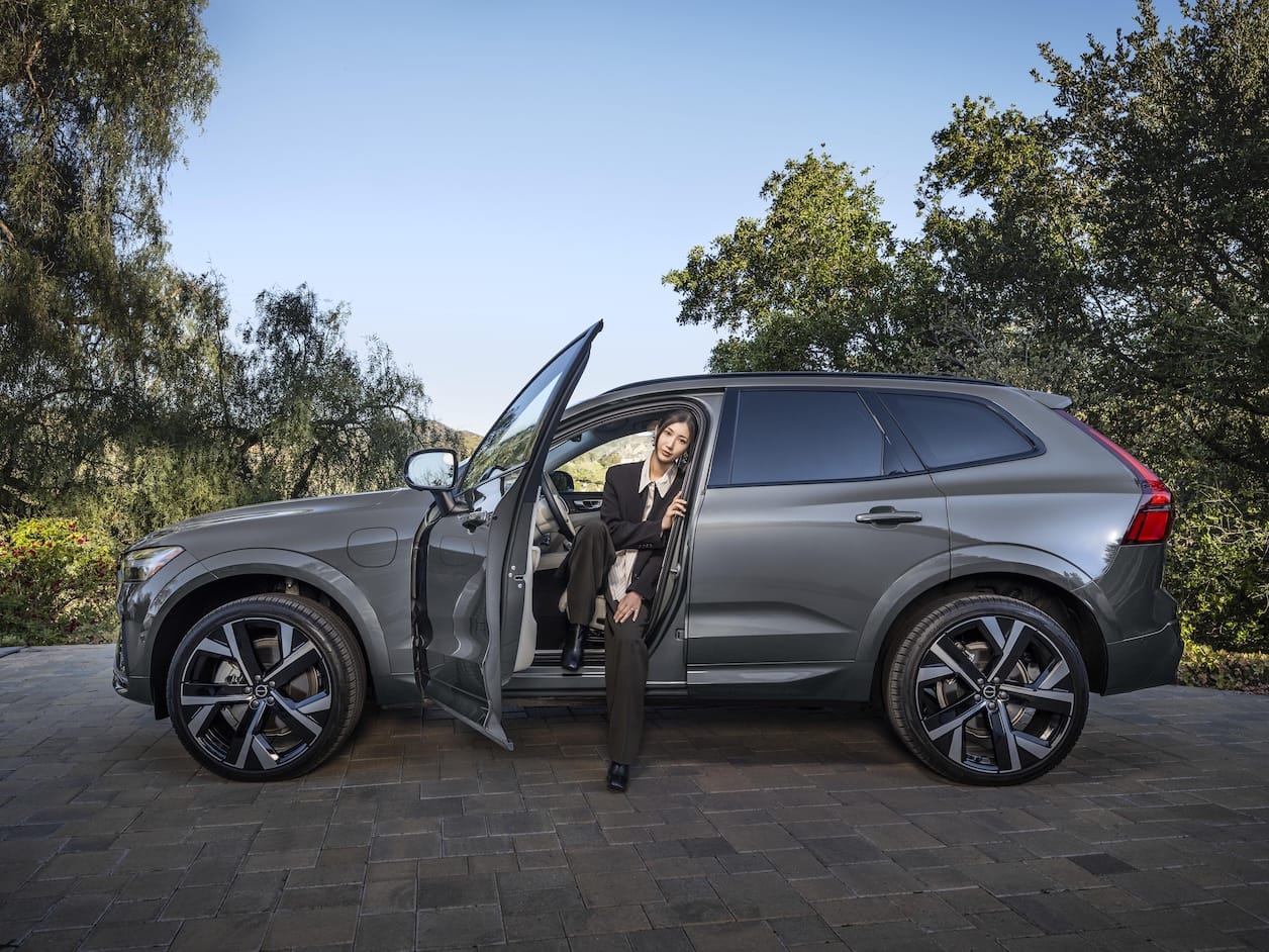 EJAE sitting inside a Volvo XC60